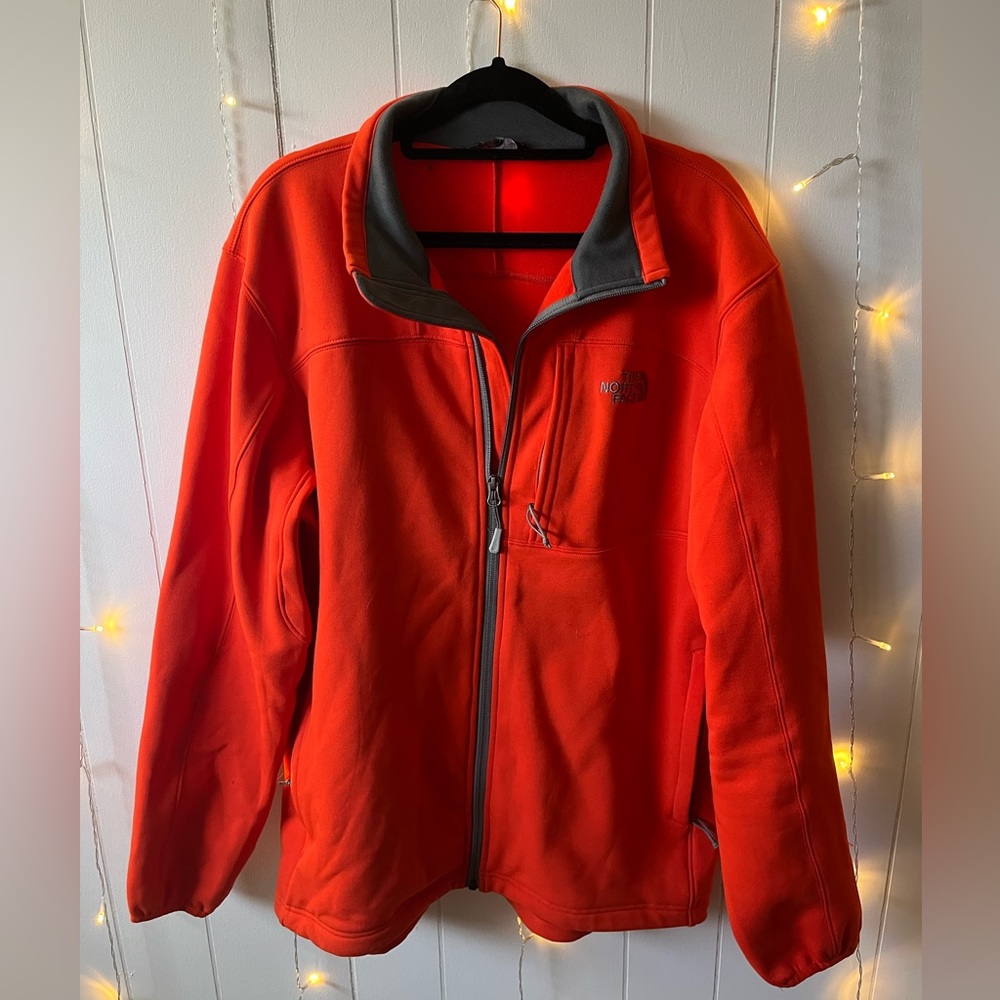 The North Face orange men’s jacket, large